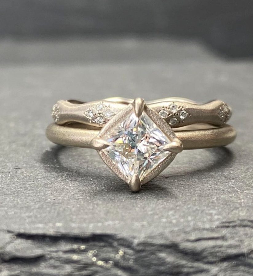 Custom ring with clustered colored gemstones