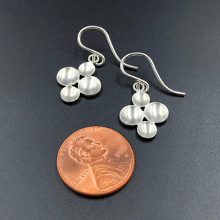 Four Parabolic Disc Earrings