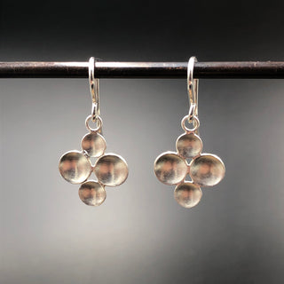 Four Parabolic Disc Earrings