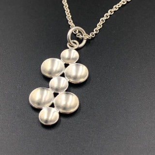 Seven Parabolic Discs Necklace