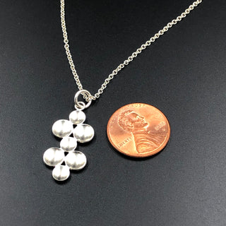 Seven Parabolic Discs Necklace