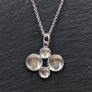 Four Parabolic Disc Necklace