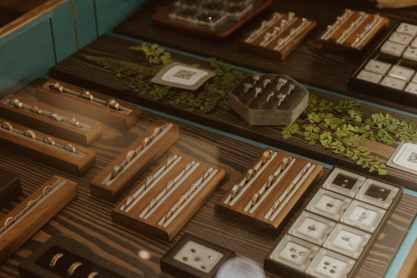 Trays of gemstones and settings in the studio